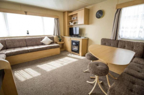 8 berth caravan with WiFi at Martello Beach Holiday Park in Essex ref 29025Y